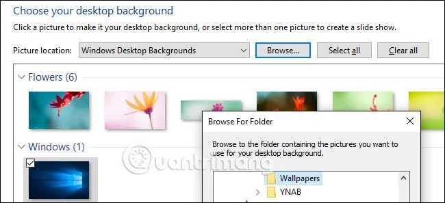 Arahan untuk memasang kertas dinding berbeza pada setiap skrin Windows 10
