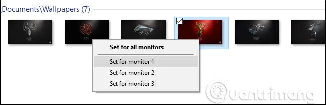Arahan untuk memasang kertas dinding berbeza pada setiap skrin Windows 10