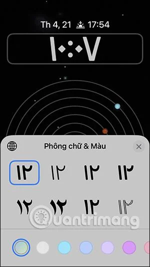 Arahan untuk menukar gaya jam skrin kunci iPhone