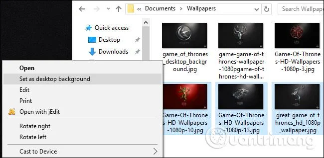 Arahan untuk memasang kertas dinding berbeza pada setiap skrin Windows 10