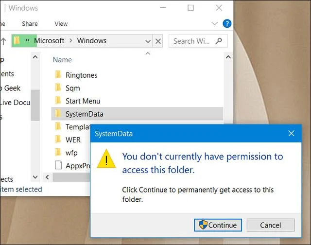วิธีลบรูปภาพเก่าออกจากประวัติหน้าจอล็อคของ Windows 10