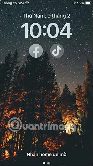 Bagaimana untuk membuka aplikasi dari skrin kunci iPhone