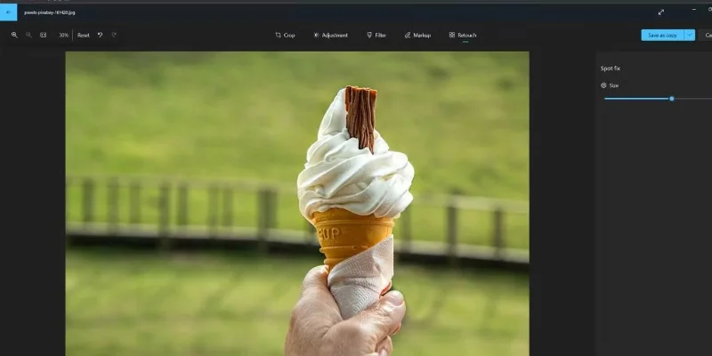 Hoe u de functies Diavoorstelling en Spot Fix gebruikt in de Foto's-app op Windows 11