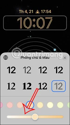 Arahan untuk menukar gaya jam skrin kunci iPhone