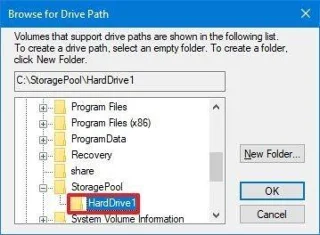 Arahan untuk memasang cakera keras ke dalam folder pada Windows 10